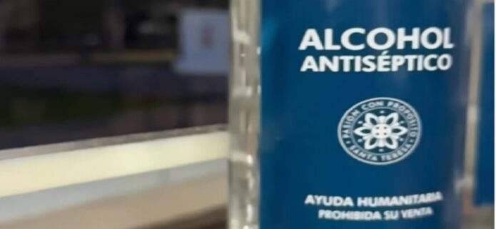 Santa Teresa produce alcohol antiséptico para atender contingencia